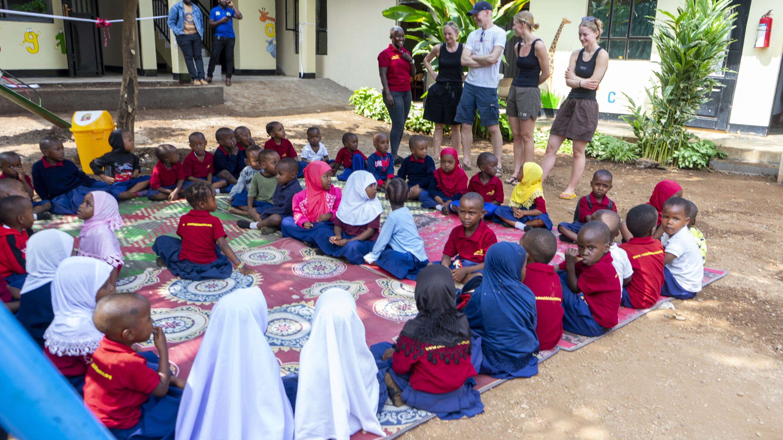 Children at Moshi Kids Centre sharing a nutritious meal together