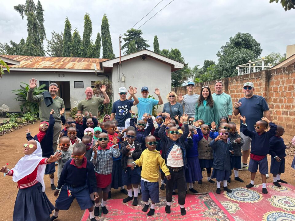 Child attending school in Tanzania with support from education donations