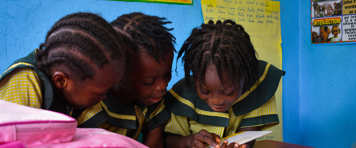Happy children engaging safely in classroom activities at Moshi Kids Centre