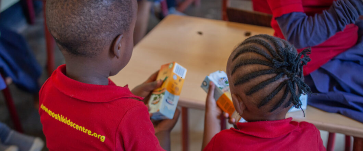 Children participating in education at a Tanzania charity centre